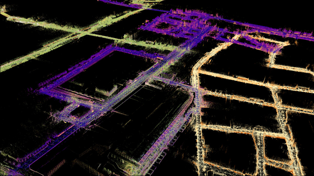 Exemple de carte à l’échelle urbaine réalisée grâce à la cartographie en 3D d’Exwayz et à la fonctionnalité multi-sessions : les zones jaunes datent de septembre 2022, tandis que la partie violette a été réalisée en novembre 2022 et la verte 6 mois plus tard, en mai 2023. Le SLAM multi-sessions détecte la zone redondante dans chaque carte avant de procéder à un assemblage précis pour créer une seule carte cohérente à l’échelle locale et mondiale