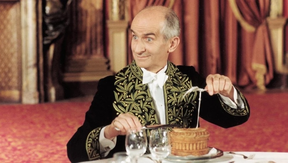 Image tirée du film L'aile ou la cuisse, où Louis de Funes incarne le propriétaire d'un guide gastronomique
